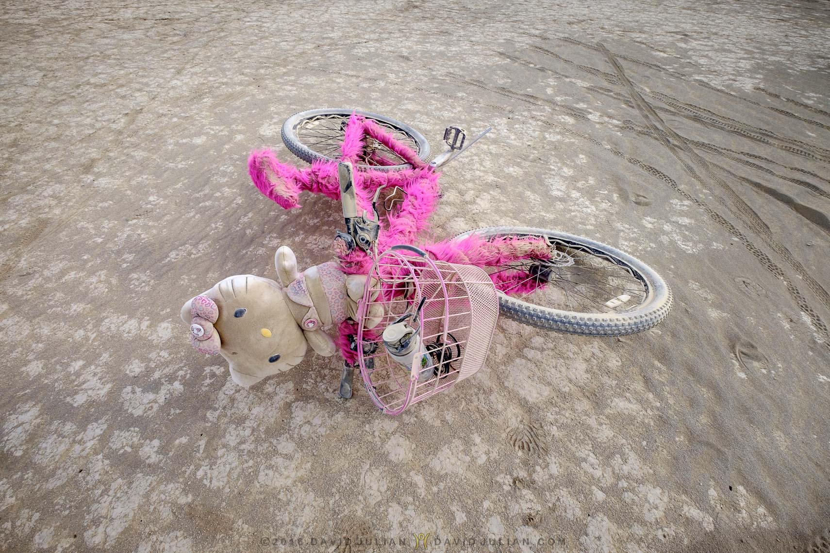 Abandoned Hello Kitty bike in deep playa-
